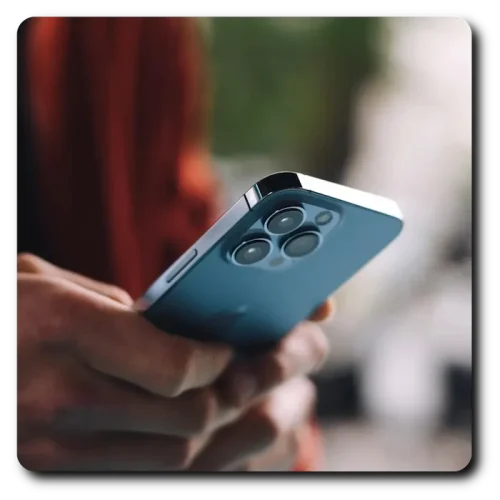 A hand holding a phone